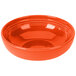 A Fiesta china bistro bowl with an orange rim on a white background.