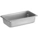A Vigor stainless steel steam table pan on a white counter.