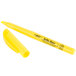 A yellow Bic Brite Liner highlighter pen with a black tip.