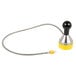 A yellow and black metal Cooper-Atkins Type-K weighted griddle surface probe with a cable.