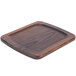 An American Metalcraft rimmed ash wood serving board with a dark brown finish.