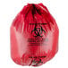 A red low density garbage bag with a biohazard symbol in black.