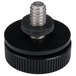 A black screw with a black plastic cap and metal washer.