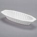 A white plastic Fineline Flairware serving boat with wavy lines.