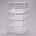 A Cal-Mil clear plastic display case with four shelves.