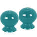 A pair of turquoise Fiesta salt and pepper shakers.