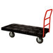 A black and red Rubbermaid platform truck with wheels.