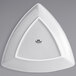 A white triangle shaped Tuxton Concentrix china plate.