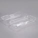 Two Dart clear hinged PET plastic strudel containers with lids.