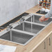 Regency 16" x 20" x 12" 16-Gauge Stainless Steel Three Compartment Drop-In Sink with (2) 8" Faucets Main Thumbnail 1