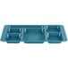 A teal plastic tray with six compartments.