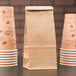 1/2 lb. Brown Kraft Paper Customizable Coffee Bag with Reclosable Tin Tie - 100/Pack Main Thumbnail 1