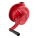 A red metal oil pump with a black handle.