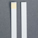 A white rectangular FMP test strip with a black border.