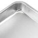 An Advance Tabco wire in rim aluminum sheet pan with a silver handle.