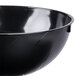 A close-up of a Fineline black plastic bowl.