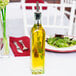 A Tablecraft olive oil cruet on a table