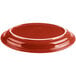 A red Fiesta china platter with a white rim.
