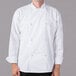 A man wearing a Mercer Culinary white chef jacket.