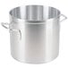 A large silver aluminum Vollrath stock pot with two handles.