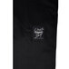 Chef Revival unisex black baggy chef pants with a black label with white text.