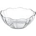 A clear glass Arcoroc bowl with a scalloped edge.