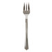 A WNA Comet Reflections Petites stainless steel look tasting fork with a silver handle.