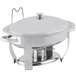 A Vollrath stainless steel oval chafer with a lid.