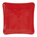 A red square GET Melamine plate with a spiral pattern.