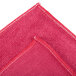 A red Unger SmartColor microfiber cleaning cloth with a white border.