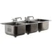 A stainless steel Advance Tabco drop-in sink with three compartments and three faucets.