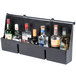 A black metal wall mounted holder with 7 bottles of alcohol.