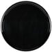 A black round catering tray.