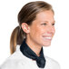 A woman wearing an Intedge denim chef neckerchief around her neck.