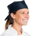 A woman wearing a denim chef neckerchief.