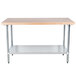 An Advance Tabco wood top work table with a galvanized metal undershelf.