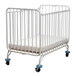 A white L.A. Baby metal folding crib with blue wheels.