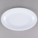 A white plastic oval tray with a white rim.