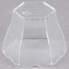 A clear plastic hexagon-shaped bowl with a clear surface.