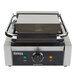 A Galaxy commercial panini grill with grooved top and smooth bottom plates.