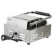 A silver rectangular Galaxy Panini Grill with black wires and a black handle.