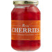 A jar of Regal Orange Maraschino Cherries with Stems.