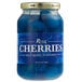 A blue jar of Regal Maraschino Cherries with blue label and blue cherries inside.