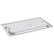A Vollrath stainless steel 1/3 size steam table pan cover.