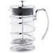A Libbey glass and stainless steel French press with metal handle.