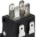 A black and silver AvaMix On / Off switch with metal terminals.