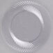 A Visions clear plastic plate with a spiral design.