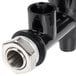 An Avantco black plastic water valve with a metal nut.
