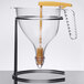 A clear Matfer Bourgeat polycarbonate funnel with a yellow handle on top.