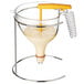 A Matfer Bourgeat automatic dispenser funnel with a yellow handle.